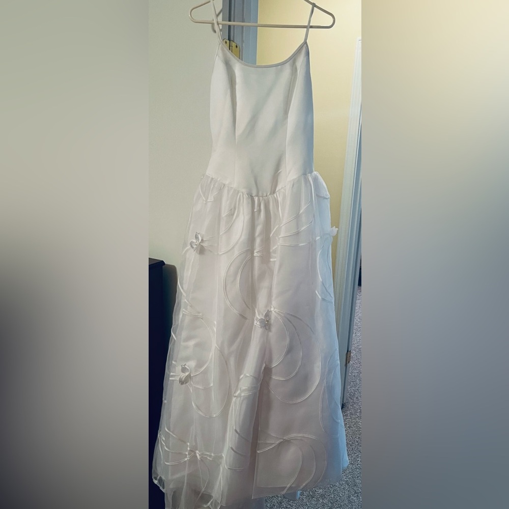 Elegant White Gown with Floral Accents